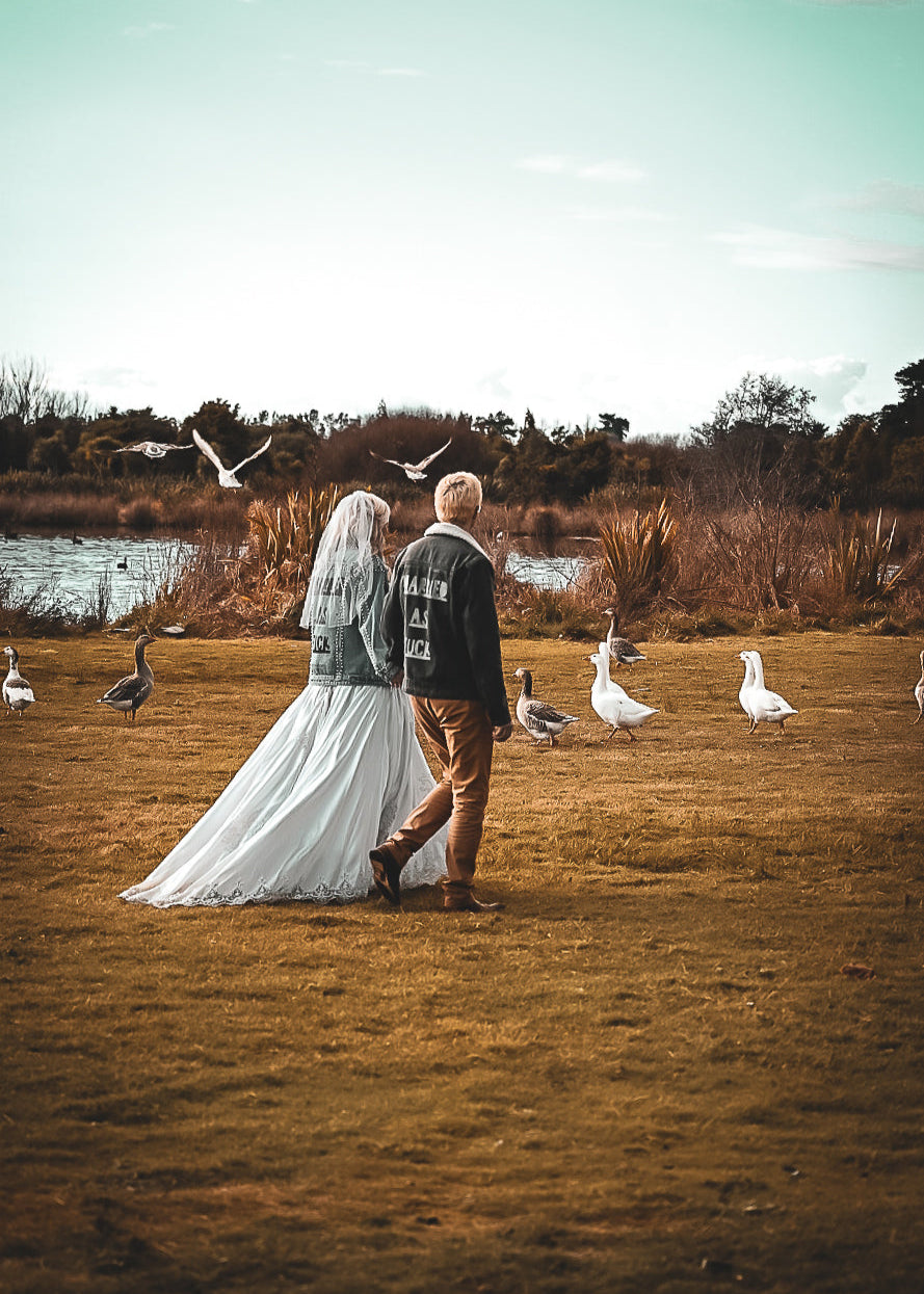 Relaxed wedding photographer capturing an elopement in New Zealand with moody, artistic style.